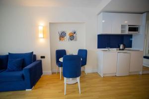 Kuchyň nebo kuchyňský kout v ubytování Hotel Orbi City Apart Sea View