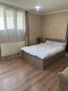 Voodi või voodid majutusasutuse zeiko s guesthouse toas