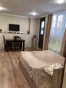 Voodi või voodid majutusasutuse zeiko s guesthouse toas