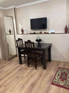 Televiisor ja/või meelelahutuskeskus majutusasutuses zeiko s guesthouse