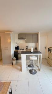 Η κουζίνα ή μικρή κουζίνα στο Appartement avec terrace à Juvignac