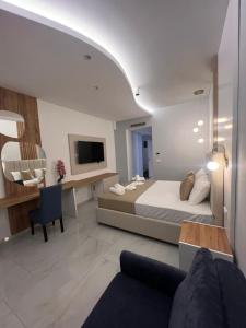 TV a/nebo společenská místnost v ubytování Hotel Adler