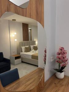 Postel nebo postele na pokoji v ubytování Hotel Adler