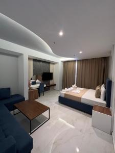 TV a/nebo společenská místnost v ubytování Hotel Adler