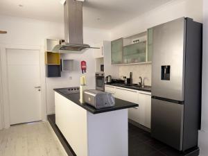 Η κουζίνα ή μικρή κουζίνα στο Alexandra Court