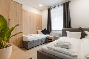 Postel nebo postele na pokoji v ubytování Hotel Montenegro