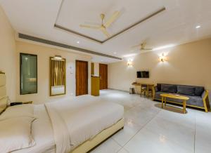 Ένα ή περισσότερα κρεβάτια σε δωμάτιο στο Hotel Sapphire Premium Hotel & Suite