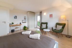 Postel nebo postele na pokoji v ubytování TinyGreens B & B