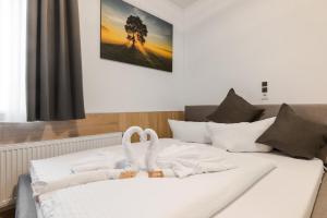 Postel nebo postele na pokoji v ubytování Hotel Montenegro