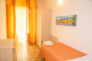 Postel nebo postele na pokoji v ubytování Hotel Ariston Riccione