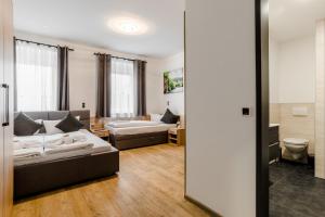 Postel nebo postele na pokoji v ubytování Hotel Montenegro