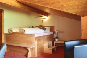 Postel nebo postele na pokoji v ubytování Boutique-Hotel Vincenz