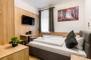 Postel nebo postele na pokoji v ubytování Hotel Montenegro