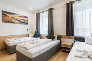 Postel nebo postele na pokoji v ubytování Hotel Montenegro