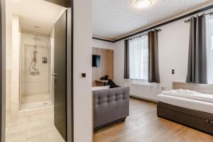 Postel nebo postele na pokoji v ubytování Hotel Montenegro