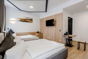 Postel nebo postele na pokoji v ubytování Hotel Montenegro