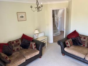 Χώρος καθιστικού στο Northants Guest House