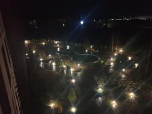 an overhead view of a park at night with lights at Aspen Luxury Apartamnet in Razlog
