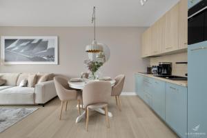 Η κουζίνα ή μικρή κουζίνα στο Baltini Premium Apartament Polanki Aqua
