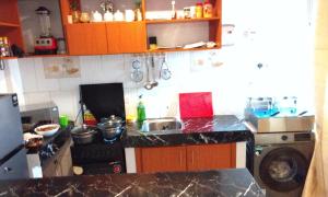 Kuchyň nebo kuchyňský kout v ubytování Pineapple Apartments