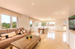 Una televisión o centro de entretenimiento en Villa Can Luciana