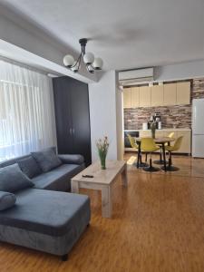 Posezení v ubytování Apartament Compozitori cu parcare și balcon