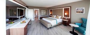 Un ou plusieurs lits dans un hébergement de l'établissement Wome Deluxe Hotel - Halal All Inclusive