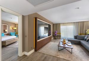 Un ou plusieurs lits dans un hébergement de l'établissement Wome Deluxe Hotel - Halal All Inclusive