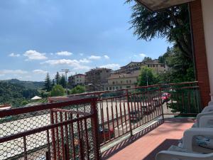 a balcony with a view of the water at A Casa di Vanna in Montese