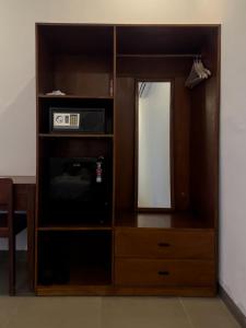 Kalamoana House的电视和/或娱乐中心