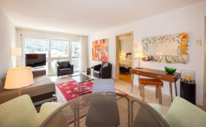 TV a/nebo společenská místnost v ubytování Residenz Larix Apartments