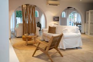 A bed or beds in a room at Moorea Boutique - Only Adults