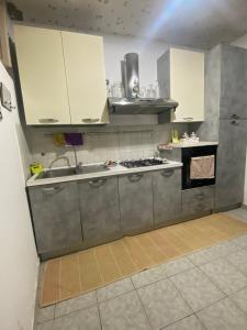 Kuchyňa alebo kuchynka v ubytovaní Casa vacanza La Ninfea intera casa