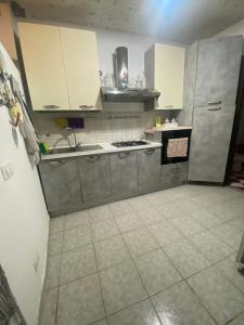 Kuchyňa alebo kuchynka v ubytovaní Casa vacanza La Ninfea intera casa