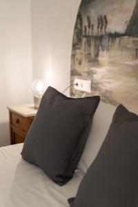 A bed or beds in a room at Moorea Boutique - Only Adults