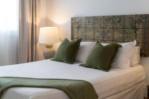 A bed or beds in a room at Moorea Boutique - Only Adults