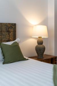 A bed or beds in a room at Moorea Boutique - Only Adults