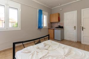 Η κουζίνα ή μικρή κουζίνα στο Elpida Hotel