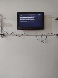 a flat screen tv sitting on top of a wall at El CAMPITO in La Ramada +5 photos