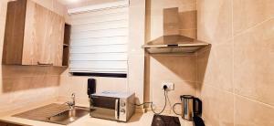 Η κουζίνα ή μικρή κουζίνα στο Casa Bianca, OSU, Premium Luxury, Free breakfast, Pool & gym, Restaurant, Airport 15 mins +119 φωτογραφίες
