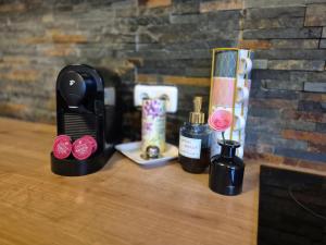 a counter with cosmetics and a phone on a table at OTILIA apartment in Zell am See