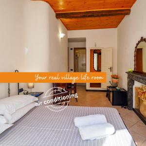 Postel nebo postele na pokoji v ubytování Macaia Room #1 with AC
