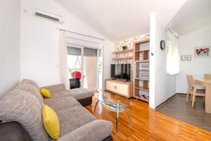 Μια τηλεόραση ή/και κέντρο ψυχαγωγίας στο Apartman XOXO +32 φωτογραφίες