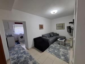 Χώρος καθιστικού στο Apartman Mint