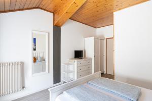 Postel nebo postele na pokoji v ubytování Gasthof Salurn