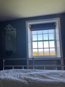 Ένα ή περισσότερα κρεβάτια σε δωμάτιο στο Hillhead Farm Bed and Breakfast +18 φωτογραφίες