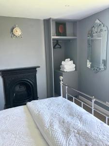 Ένα ή περισσότερα κρεβάτια σε δωμάτιο στο Hillhead Farm Bed and Breakfast