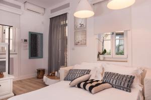 Postel nebo postele na pokoji v ubytování Casa Regina Luxury House