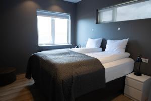 Katil atau katil-katil dalam bilik di Luxury Villa in Golden Circle with hot tub +26 gambar