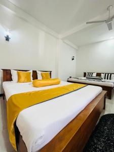 Postel nebo postele na pokoji v ubytování Sohili 3R Resort Ella